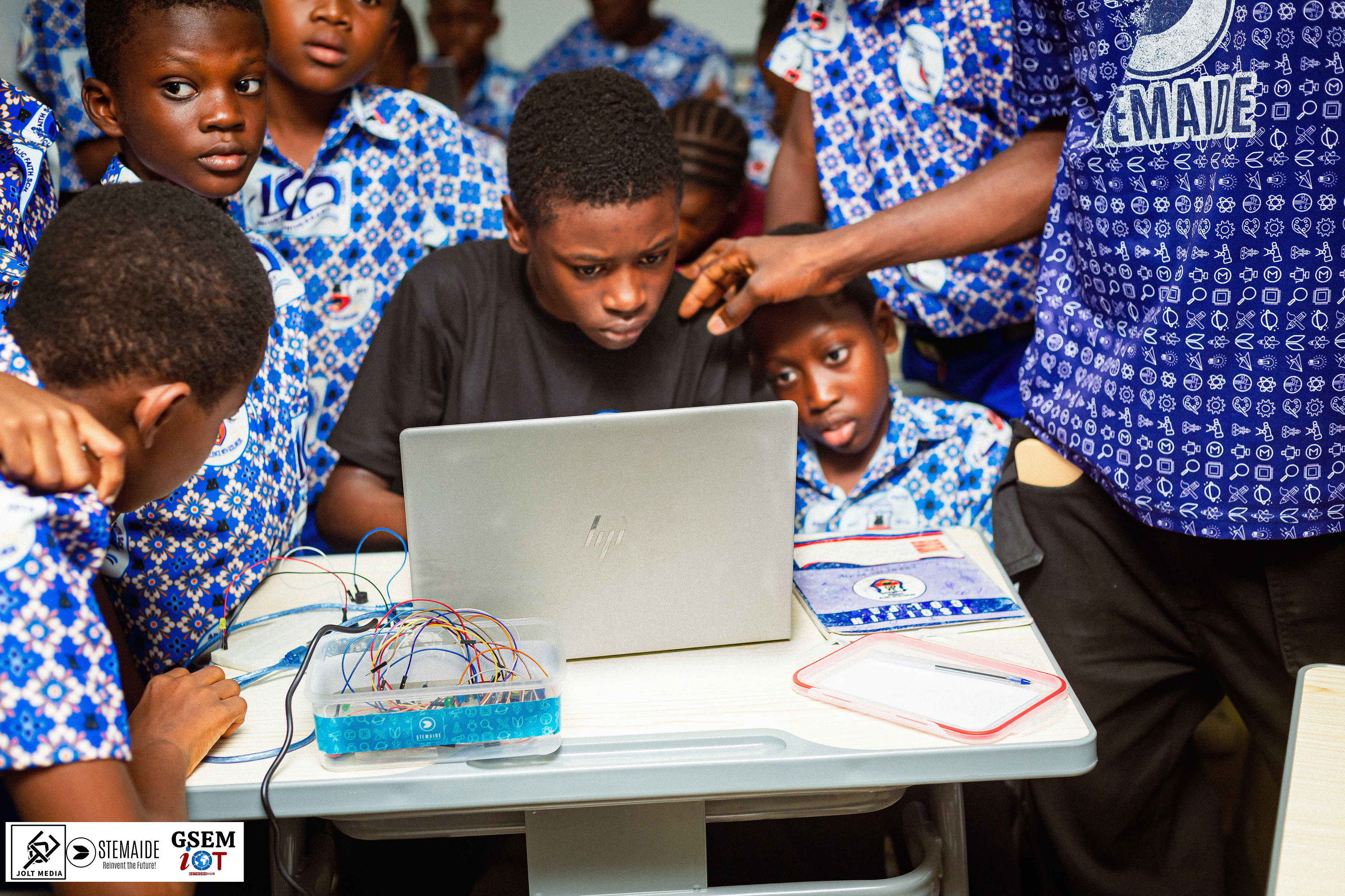 African students working with a robotic kit